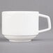A Villeroy & Boch white porcelain stackable cup with a white handle.