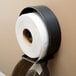 A Lavex jumbo toilet paper roll on a holder.