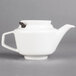 A white Villeroy & Boch porcelain teapot with a handle