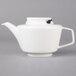 A white Villeroy & Boch porcelain teapot with a black handle.