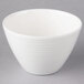 A white Villeroy & Boch porcelain bowl with lines on it.