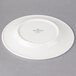 A Villeroy & Boch white porcelain plate with a small white plate on it.