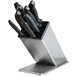 A Dexter-Russell knife block set in a metal stand with black and grey handles on the knives.