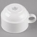 A white porcelain stackable cup with a handle.