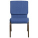 A blue church chair with a gold vein frame and wooden legs.