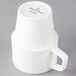 A white Villeroy & Boch porcelain mug with a handle.