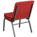 A Flash Furniture red church chair with metal legs.