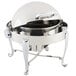 A Bon Chef stainless steel round chafer with Roman legs and a lid on a stand with chrome accents.