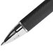 A close-up of a black and silver Uni-Ball Jetstream pen.