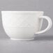 A white Villeroy & Boch porcelain cup with a handle.