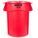 A red Rubbermaid Brute round trash can with lid.