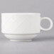 A close up of a Villeroy & Boch white porcelain stackable cup with a handle.