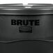A close up of a Rubbermaid BRUTE 44 gallon black trash can with lid.