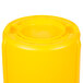 A yellow plastic container with a lid.