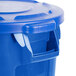 A blue Rubbermaid recycling can with a blue lid.