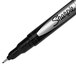 A close up of a Sharpie plastic point stick pen with black ink and a black barrel.