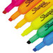 A group of Sharpie highlighters in assorted neon colors.