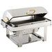A silver rectangular Bon Chef chafer with a lid on a tray.