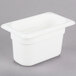 A white Cambro plastic food pan with a lid.