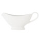 A close-up of a white Libbey porcelain sauce boat with a handle.