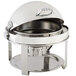 A Bon Chef stainless steel round chafer with chrome accents and a lid on a metal stand.