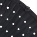 A black silicone splatter screen with holes.