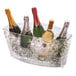 A Franmara Viking customizable long bucket filled with bottles of wine on a table in a winery cellar.