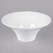 A white Vollrath fluted melamine pedestal bowl.