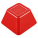 A red pyramid shaped Vollrath melamine bowl.
