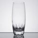 A clear Reserve by Libbey chisel cooler glass with a design on it.