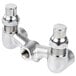 A silver T&S metal mixing valve with two bottom and one top pipe fittings.