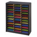 A black Safco file organizer shelf with colorful papers.