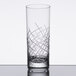 A close-up of a Libbey Crosshatch beverage glass with a clear design.
