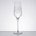 A Reserve by Libbey Crosshatch Champagne Flute with a thin stem and a design on it.
