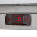 A Beverage-Air worktop refrigerator with a digital thermostat displaying 38.