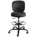 A Safco Vue heavy-duty office stool with a black seat and back.