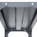 A Safco dark gray commercial steel shelving unit with two screws in it.