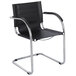 A Safco black leather guest chair with chrome legs.