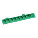 A green plastic Cactus Mat corner ramp with male end.
