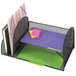 A black wire mesh Safco desk organizer with colorful papers in the sections.