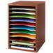 A Safco cherry wood literature organizer with 11 sections filled with different colored papers.