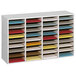 A gray Safco wood file organizer with many different colored folders on the shelves.