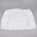 A white L.A. Baby crib pad cover.