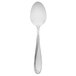 A close-up of a Oneida Scroll stainless steel dessert spoon with a white background.