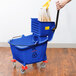 Lavex Janitorial 35 Qt. Blue Mop Bucket & Side Press Wringer Combo Main Thumbnail 6