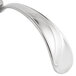 A Bon Chef silver bouillon tasting spoon with a curved handle.