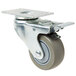 A Baker's Mark swivel plate caster with a metal and grey wheel.