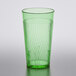 A green Thunder Group Belize plastic tumbler with a wavy design.