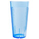 A blue plastic Thunder Group Belize tumbler with a wavy design.