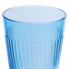A close up of a Thunder Group blue polycarbonate tumbler with a thin rim.